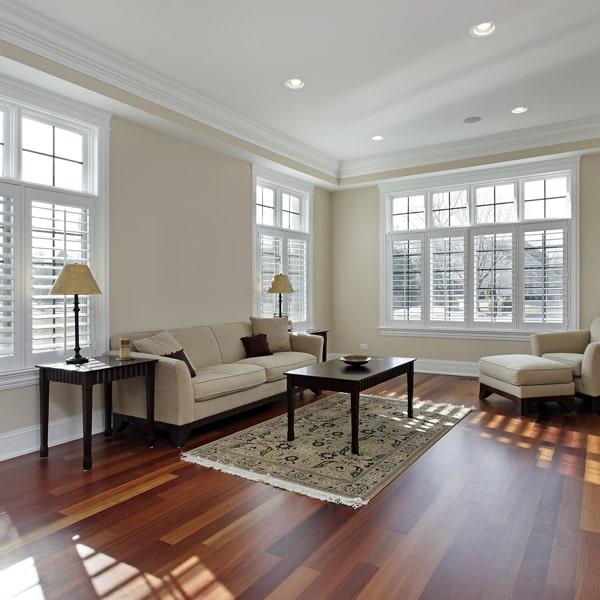 laminate flooring is a cost-effective, durable, and easy-to-maintain option that can mimic the look of hardwood or tile